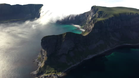Wide-revealing-aerial-footage-of-the-island-of-Vaeroy,-Lofoten-Islands-in-Norway