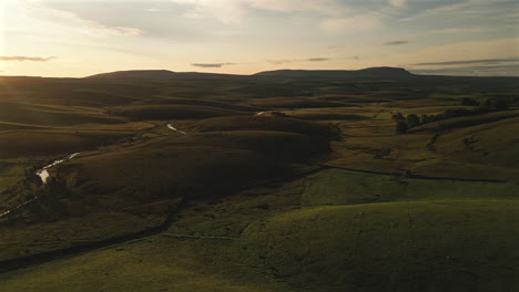 Establishing-Drone-Shot-Over-Yorkshire-Dales-Hills-with-River-Ribble-at-Golden-Hour