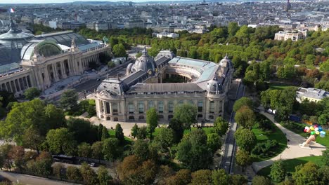 Petit-Palais-and-Grand-Palais-in-Paris-with-La-Defense-financial-district-in-background,-France