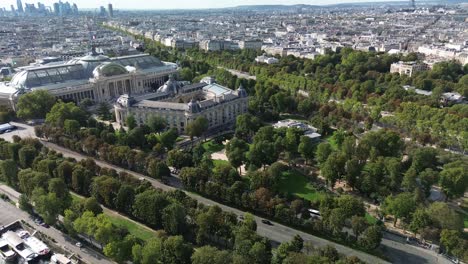 Petit-Palais-and-Grand-Palais-in-Paris-with-financial-district-in-background,-France