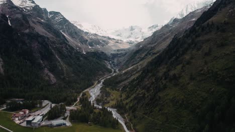 Enjoy-breathtaking-aerial-footage-captured-by-an-drone-as-it-glides-over-the-impressive-Alpine-landscape-and-scenic-mountain-roads
