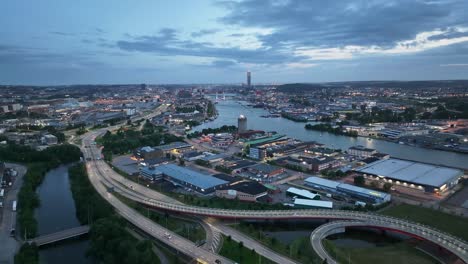 Traffic-on-highway-and-cityscape-of-Gothenburg,-Sweden