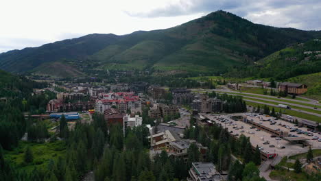 Aerial-view-overlooking-the-Vail-village,-cloudy,-summer-day-in-Colorado,-USA