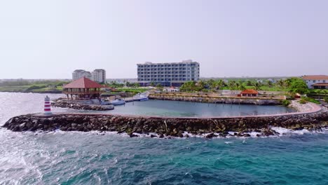 Waterfront-Hotel-Hilton-Garden-Inn-La-Romana-In-Dominican-Republic---aerial-drone-shot