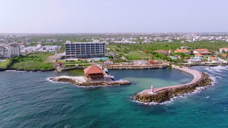 Aerial-View-Over-Hotel-Hilton-Garden-Inn-La-Romana-In-Dominican-Republic---drone-shot