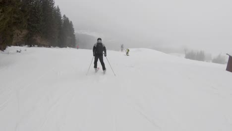 Skiing-from-the-slopes-in-Pec-Pod-Snezkou,-Czech-Republic