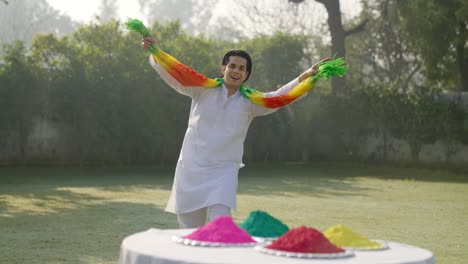 Indian-man-dancing-at-a-Holi-party