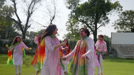 Indian-couple-dancing-at-a-Holi-party
