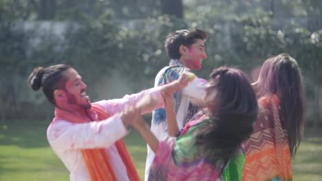 Indian-men-playing-Holi-with-their-partners