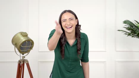 Indian-woman-laughing-on-someone