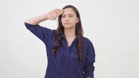 Proud-young-Indian-girl-saluting