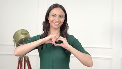 Indian-woman-showing-heart-sign