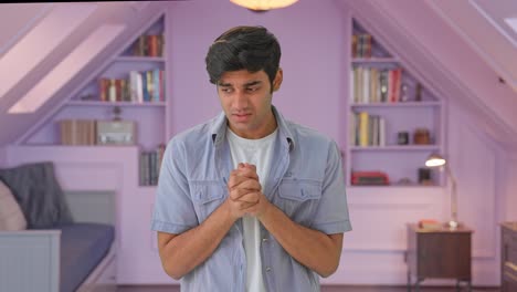 Scared-Indian-boy-praying-to-God