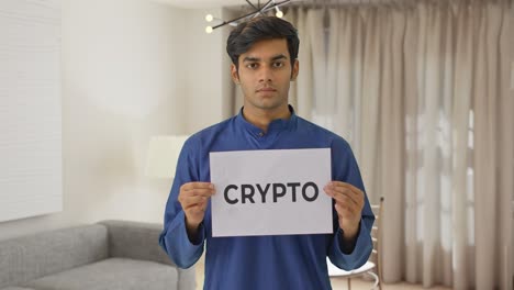 Indian-boy-holding-CRYPTO-banner