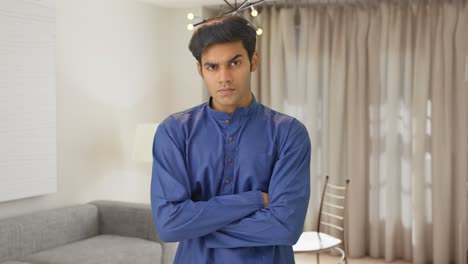 Angry-Indian-man-judging-and-observing-someone