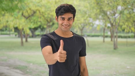 Happy-Indian-boy-showing-thumbs-up