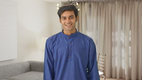 Cute-Indian-boy-winking-and-smiling