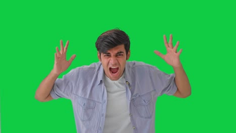 Frustrated-Indian-boy-shouting-and-screaming-Green-screen