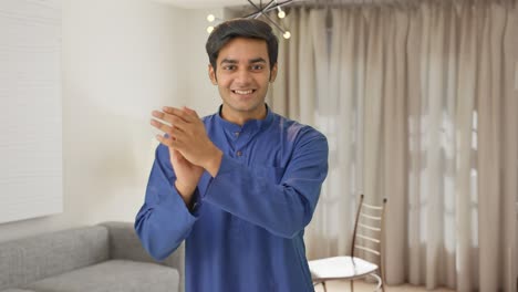 Indian-man-clapping-and-appreciating