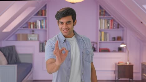 Happy-Indian-boy-showing-okay-sign