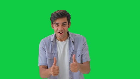 Excited-Indian-boy-showing-thumbs-up-to-the-camera-Green-screen