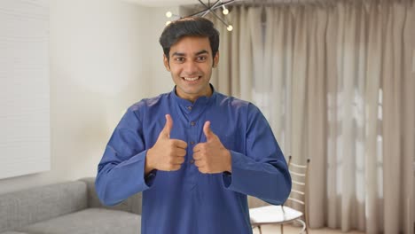 Energetic-Indian-man-showing-thumbs-up