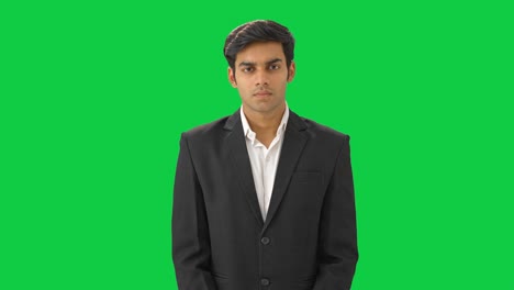 Angry-Indian-manager-staring-at-the-employees-Green-screen