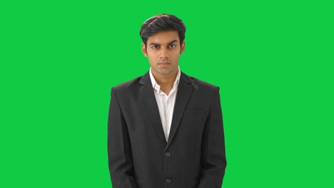 Indian-businessman-staring-at-the-employees-Green-screen