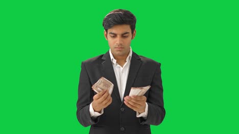 Indischer-Manager-Zählt-Geld,-Grüner-Bildschirm