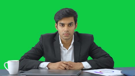 Angry-Indian-businessman-staring-at-the-camera-Green-screen