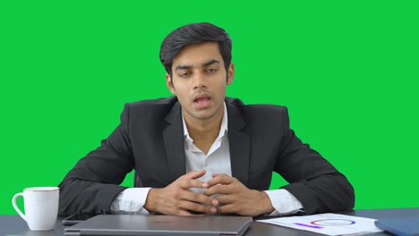 Indian-entrepreneur-discussing-a-project-with-team-Green-screen