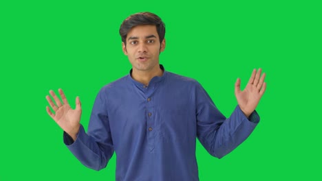 Indian-youtuber-making-a-video-Green-screen