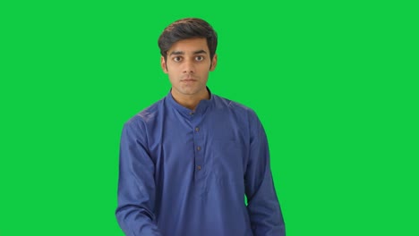 Indian-man-showing-middle-finger-Green-screen