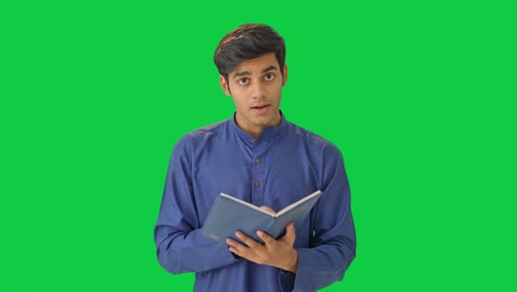 Indian-teacher-explaining-to-students-Green-screen