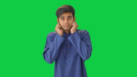 Cute-Indian-boy-asking-for-apology-Green-screen
