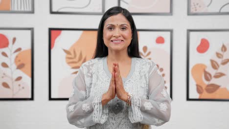 Indian-mother-greeting-namaste-and-greeting