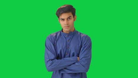 Angry-Indian-man-judging-and-observing-someone-Green-screen