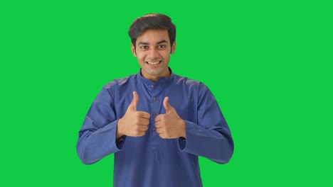 Energetic-Indian-man-showing-thumbs-up-Green-screen