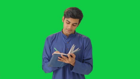 Hombre-Indio-Pensando-Y-Escribiendo-Pantalla-Verde