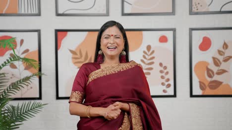 Indian-woman-laughing-while-talking