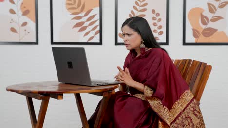 Indian-female-boss-on-video-call-meeting