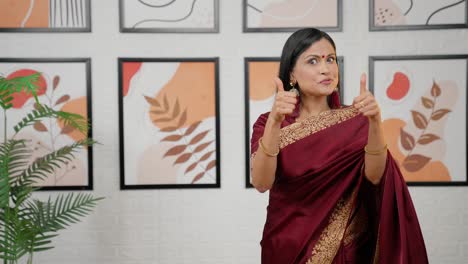 Indian-woman-pointing-towards-product-space