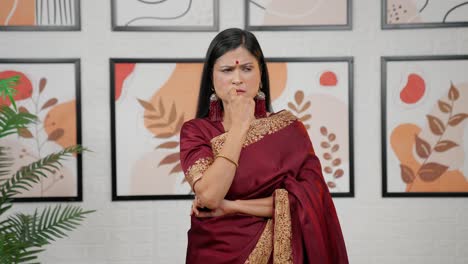 Confused-Indian-woman-thinking-something