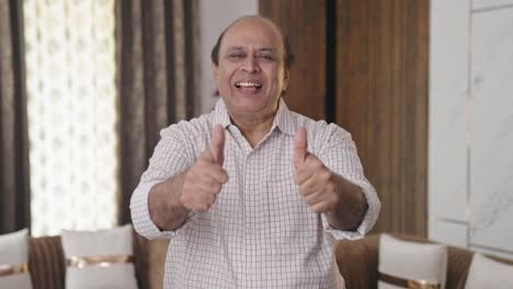 Indian-old-uncle-showing-thumbs-up