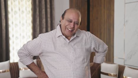 Old-Indian-fat-man-laughing-at-the-camera
