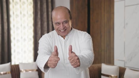 Happy-Indian-old-man-showing-thumbs-up