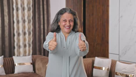 Happy-Indian-mother-showing-thumbs-up
