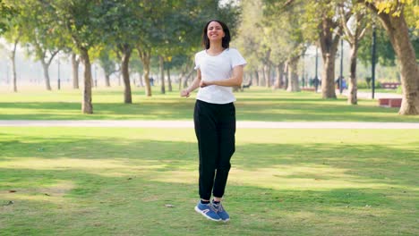 Indian-girl-doing-exercise-in-a-park-in-morning