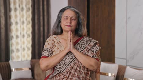 Religious-Indian-woman-praying-to-god