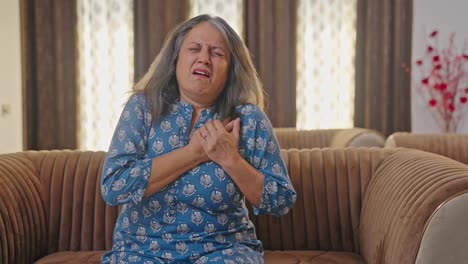 Aged-Indian-woman-having-heart-attack